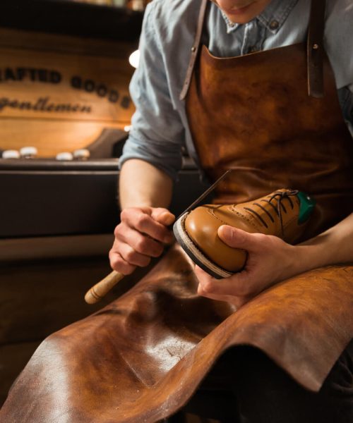 bootmaker-in-workshop-making-shoes-2021-08-26-18-21-43-utc