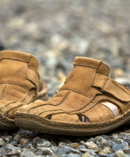 close-up-of-pair-of-old-worn-comfortable-man-class-2023-02-10-08-33-43-utc